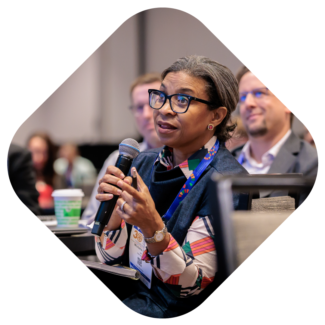 Image of a woman attendee at the conference.